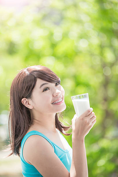 istock Young Woman drinking milk 494760766