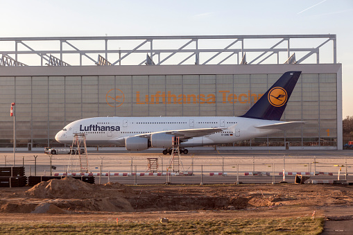 Frankfurt, Germany - April 1, 2012:  Lufthansa A380 at Lufthansa Technik wharft at Rhein Main airport . The warft was enlarged in 2008 to offer maintenance service for A380.