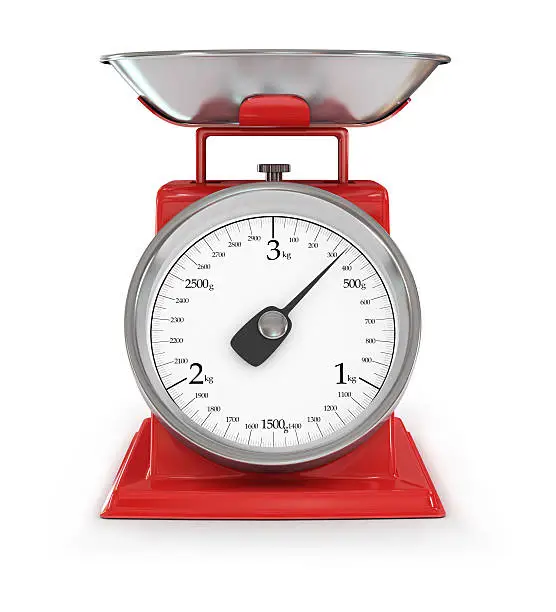 vintage red kitchen scales isolated on white background, clipping path.