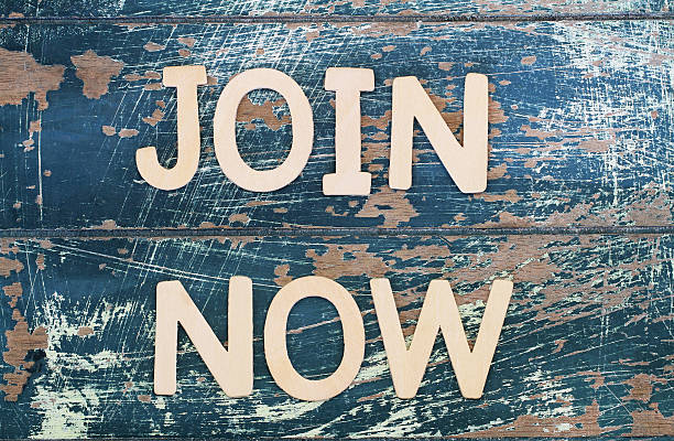 istock Join now written with wooden letters on rustic surface 494761940