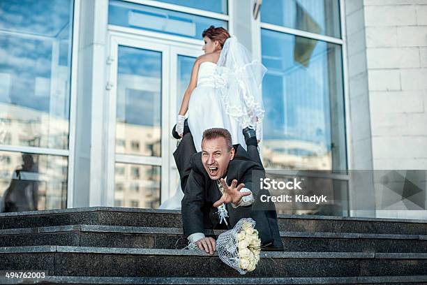 Bride Makes Groom To Marry Stock Photo - Download Image Now - Escaping, Wedding, Women