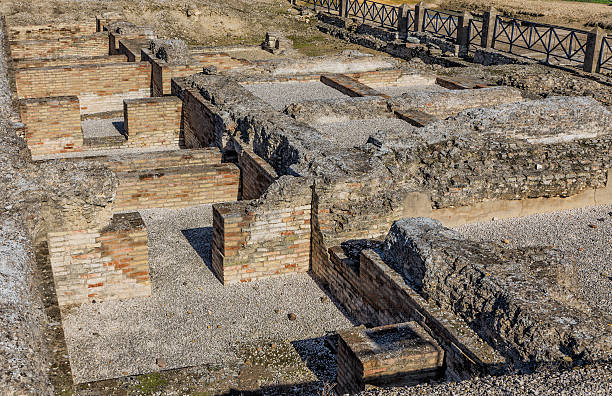 Ancient baths in Italica Italica in Santiponce, 9 km NW of Seville, Spain, is a magnificent and well-preserved Roman city and the birthplace of Roman Emperors Trajan and Hadrian. italica spain stock pictures, royalty-free photos & images