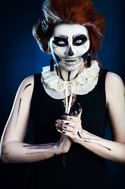 istock beautiful woman with make-up skeleton 494762456