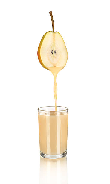 istock pear juice pouring in glass 494762582