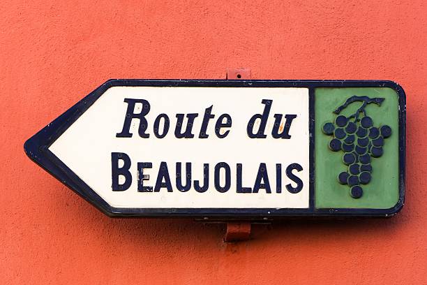 Route du Beaujolais sign, France Road of Beaujolais sign on a wall, France  beaujolais region stock pictures, royalty-free photos & images