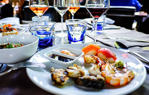 istock assorted sashimi and sushi seafood served on a white plate 494763303