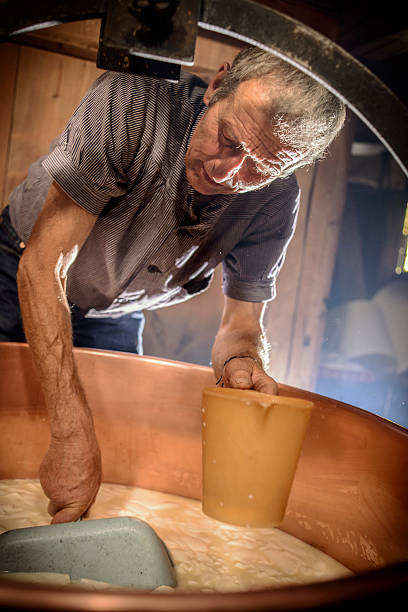 istock Traditional Cheese Making in Swiss Alps 494764678