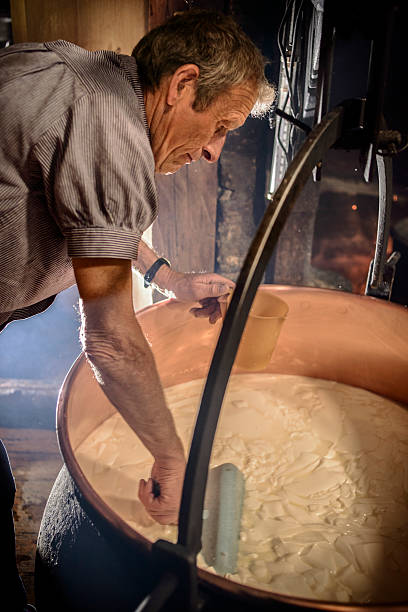istock Traditional Cheese Making in Swiss Alps 494765246