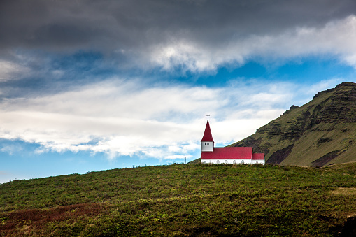 Icelandic church on hilltop above the town of Vik