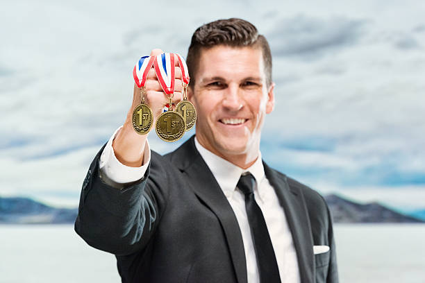 istock Businessman showing medals 494765884