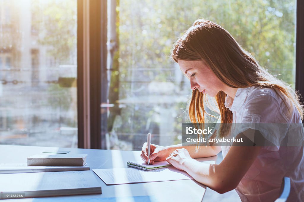 student on exam student in classroom during exam Classroom Stock Photo