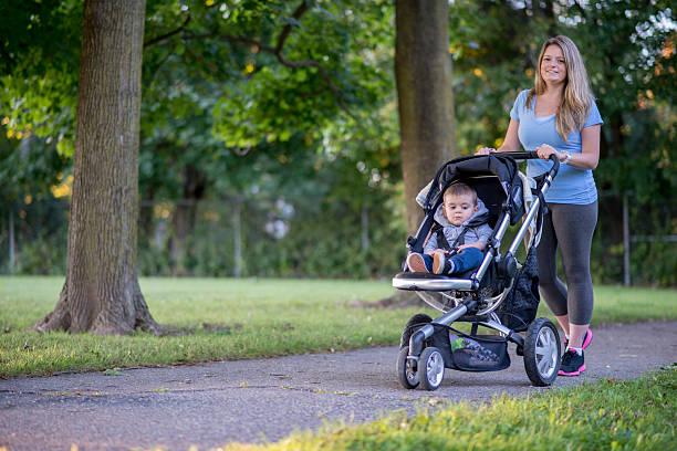 istock Mother Walking with Her Son at the Park 494766944