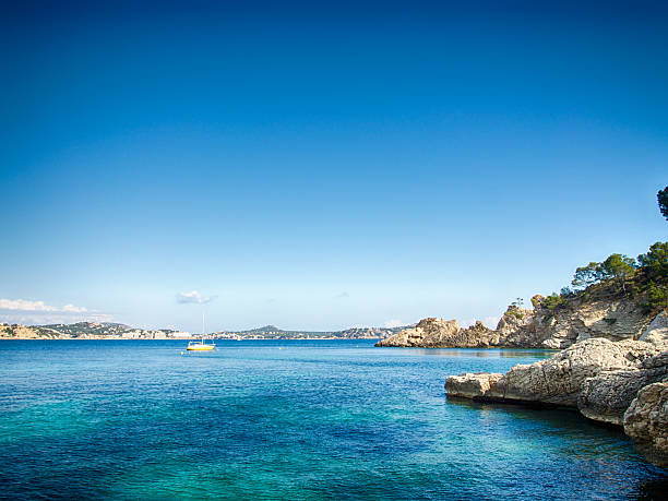 Calvia Cala Fornells turquoise mediterranean in Majorca Calvia Cala Fornells turquoise mediterranean in Majorca at balearic islands of Spain seaside views of cala fornells mallorca stock pictures, royalty-free photos & images