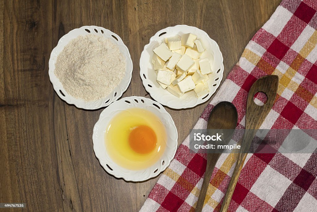 Cooking  ingredients Baking ingredients on a wood table. Bakery Stock Photo