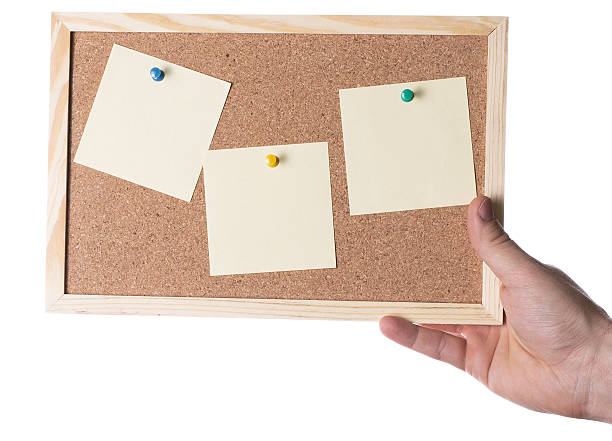 istock Hand hold the cork board isolated on white background 494781091