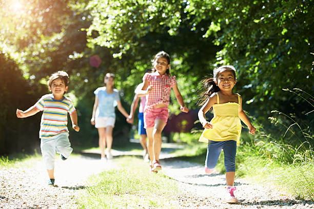 istock Asian Family Enjoying Walk In Countryside 494781821