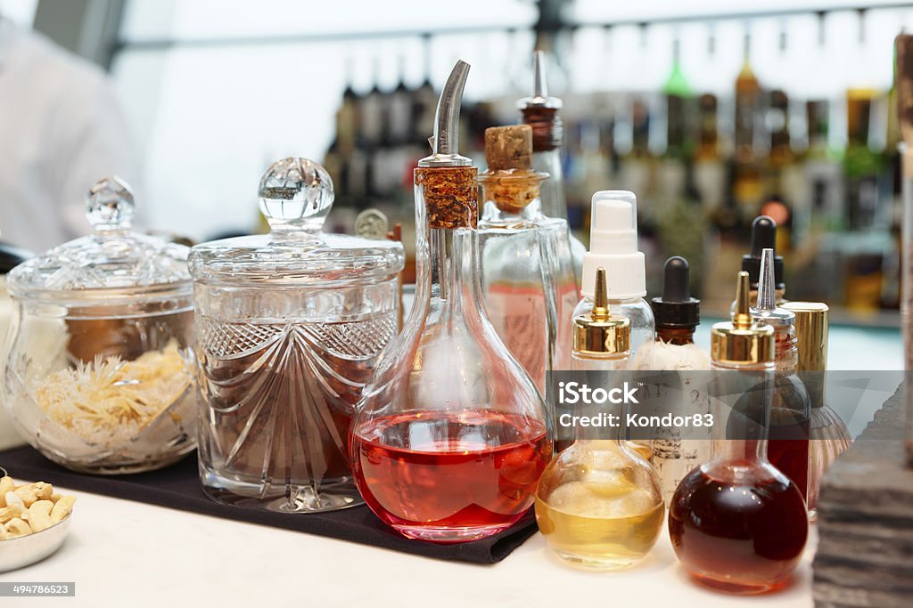 Infusions and spices on bar counter Bitters, spices and infusions on bar counter Alcohol - Drink Stock Photo