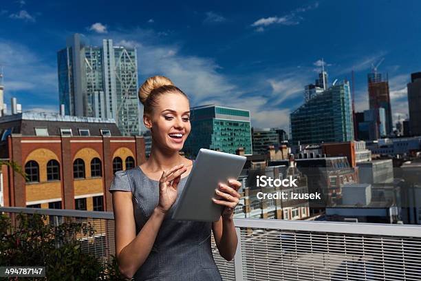 Attractive Businesswoman With Digital Tablet Stock Photo - Download Image Now - Adult, Adults Only, Anticipation