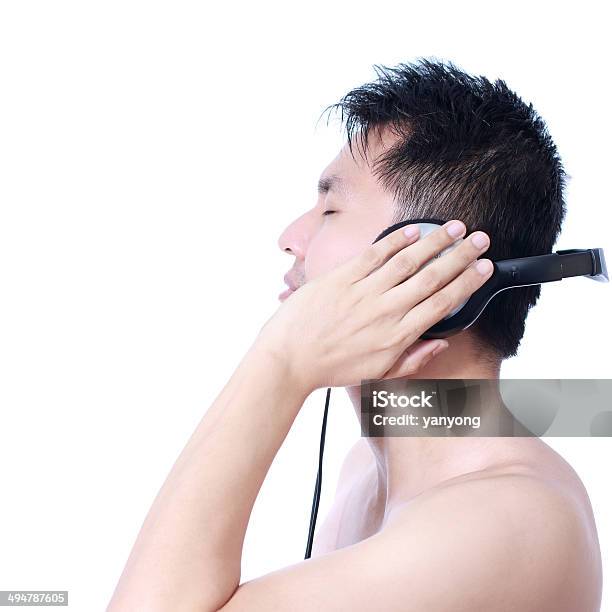 Asian Handsome Man Listen To Music By Headphone Stock Photo - Download Image Now - Adult, Animal Mouth, Art