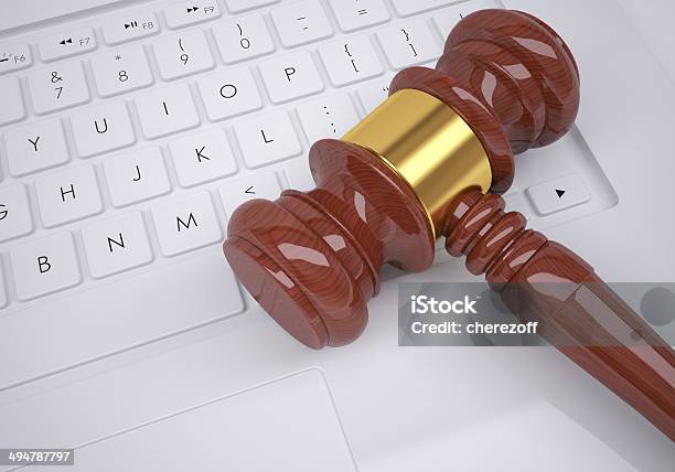 Gavel Lying On The Computer Keyboard Stock Photo - Download Image Now - Electronics Industry, Legal System, Justice - Concept