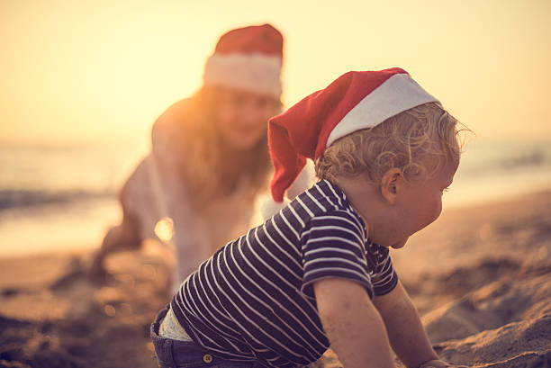istock Santa's little helper at the beach 494788386