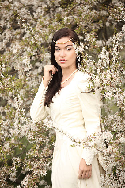istock bride wedding dress in forest vintage tree 494789064