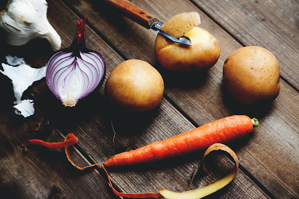 ingredients with potato carrot onion and garlic stock photo