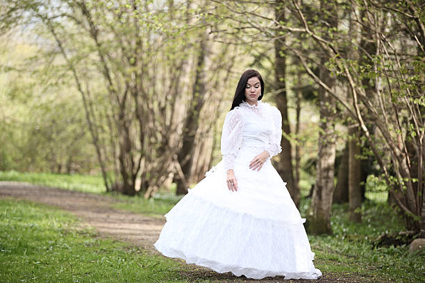 istock bride wedding dress in forest vintage tree 494789948