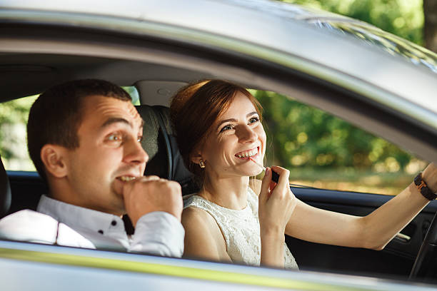 istock Husband screams until his wife applying lipstick 494793294