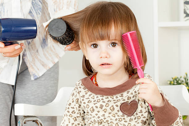 Making A Hair Style To Cute Little Girl Stock Photo - Download Image Now -  Girls, Hair Salon, Bangs - Hair - iStock