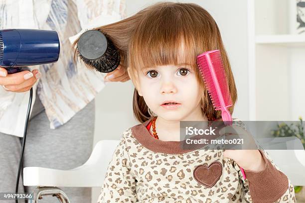Making A Hair Style To Cute Little Girl Stock Photo - Download Image Now -  Girls, Hair Salon, Bangs - Hair - iStock