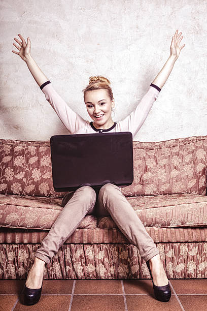istock Business woman using computer. Internet home technology. Vintage photo. 494809161