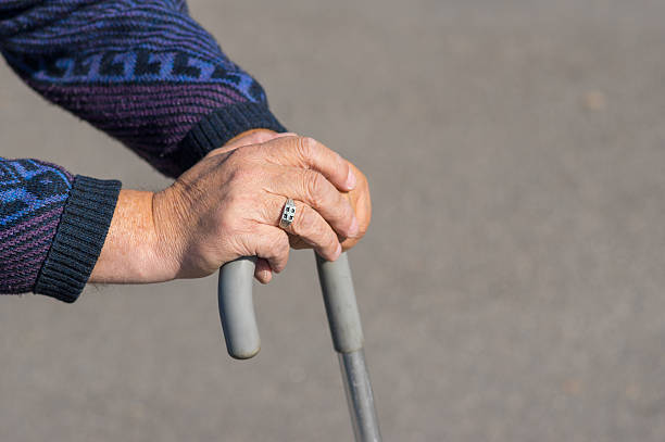 istock Hands of senior man resting on a walking stick 494809538