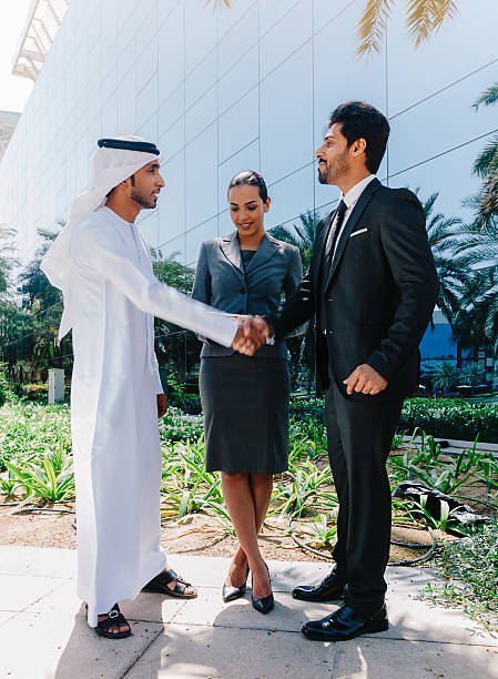 istock Arab business people shaking hands 494809588