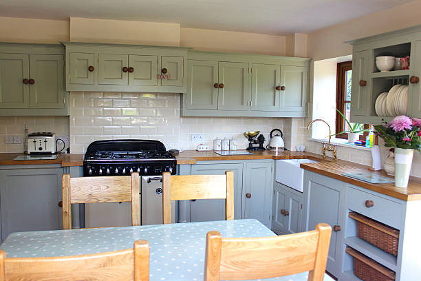 istock Traditional country kitchen, with range cooker, Belfast sink, wooden worktops 494810179