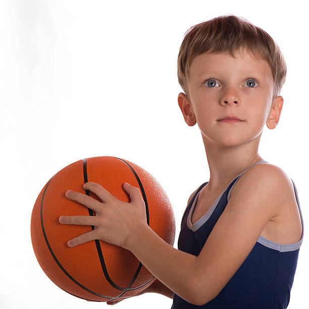 istock The boy threw a basketball ball two hands 494810468
