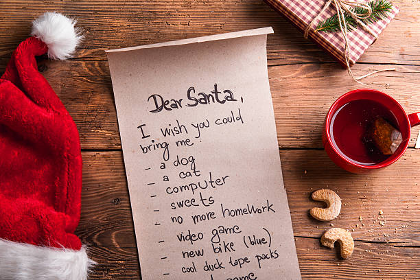 wishlist de santa - lista de deseos fotografías e imágenes de stock