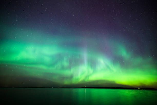 istock Northern lights over lake in finland 494810608