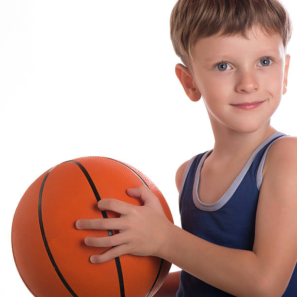 istock The boy threw a basketball ball two hands 494810856