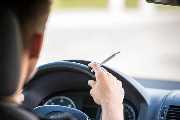 Photo of Smoking joint while driving