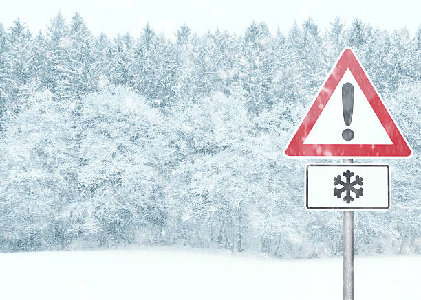winter background - snowy landscape with warning sign - ice sign bildbanksfoton och bilder
