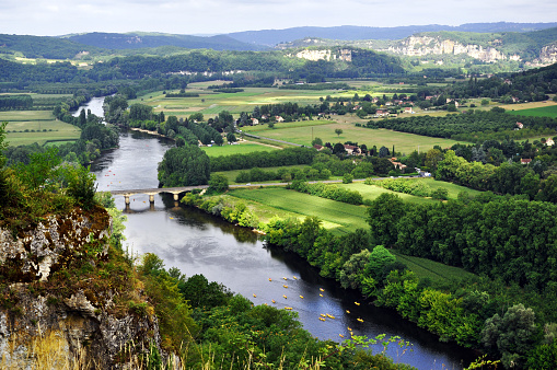 Aerial view of a bridge over the Dordogne river seen from the village of Domme.