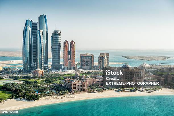 Sea And Skyscrapers In Abu Dhabi Stock Photo - Download Image Now - Abu Dhabi, United Arab Emirates, Urban Skyline