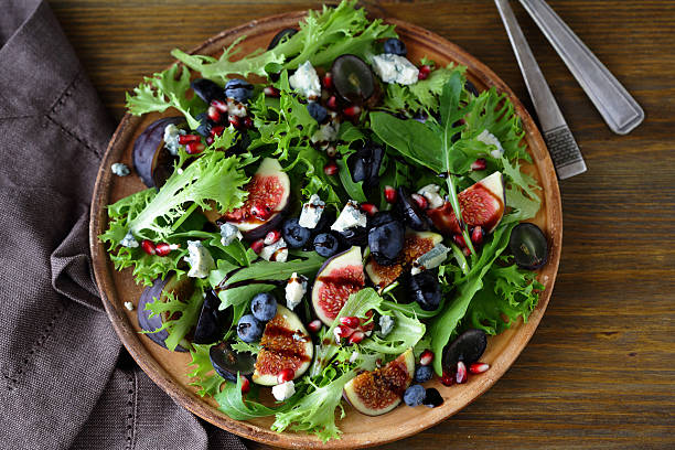 salad with figs salad with figs, food closeup plate fig blue cheese cheese stock pictures, royalty-free photos & images