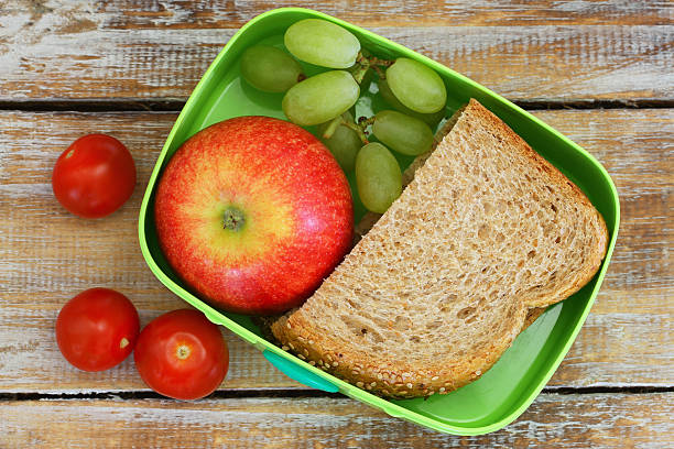 istock Lunch box consisting of wholegrain sandwich, fruit and cherry tomatoes 494827104