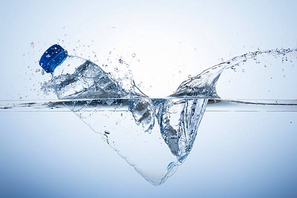 plastic bottle dive stock photo