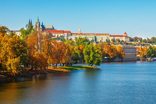 istock Autumn Prague castle over river Vltava 494829452