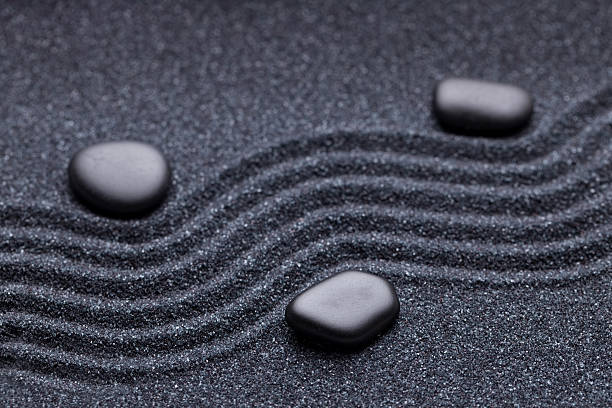 istock Zen garden with a wave lines in the sand 494829504
