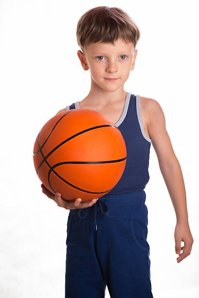 istock The boy held a basketball ball an one hand 494829508