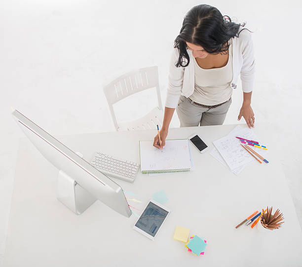 istock Creative woman working at the office 494829932